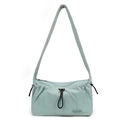 Close-up of water-resistant nylon cloud bag with drawstring detail and zip closure - Soft Mist Green