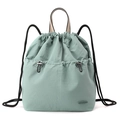 Close-up of the drawstring closure and nylon fabric texture on the mint green backpack - Soft Mist Green