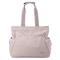 Detail view of pink waterproof tote bag with side drawstring pockets and button closure - Peach Pink