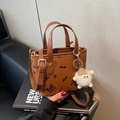 Brown contrast tote bag with illustrated patterns, detachable strap and plush charm - Brown (With Pendant)