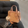 Pink crossbody bucket bag with cartoon embossed patterns and plush ball pendant - Pink (With Pendant)