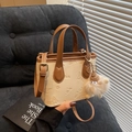Chic beige and brown contrast handbag with embossed motifs and plush charm - Off-white (With Pendant)
