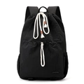 Detail of black nylon drawstring backpack with white cotton ropes and leather trim tips - Ink Black