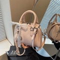 Pink faux leather bowling handbag with lace bow detail and crossbody strap for women - Pink with Pendant