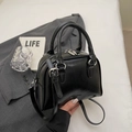 Glossy black Boston style handbag with silver hardware and adjustable shoulder strap - Black without Pendant