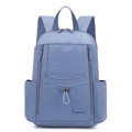 Detail view of large grey-blue nylon backpack with drawstring and front zipper pocket - Iris Blue
