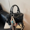 Retro black leather boston bag with embossed lettering and colorful pendant - Black with Pendant