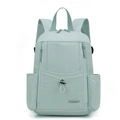 Detail of mint green nylon backpack showing front pocket with drawstring buckle and logo - Soft Mist Green