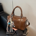 Brown glossy leather boston bag with charms and adjustable shoulder strap - Coffee with Pendant