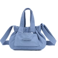 Detail of blue nylon crossbody bag featuring drawstring pleats and adjustable strap - Iris Blue