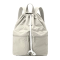Detail of light grey nylon backpack with drawstring closure and dual front zipper pockets - Bone White