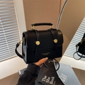 Classic black leather square crossbody bag with gold round buckles and top handle - Black