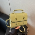 Minimalist avocado green leather crossbody square bag with top handle and metal buckles - Green
