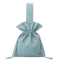 Close-up of blue nylon drawstring handbag showing waterproof fabric and hand strap - Haze Blue