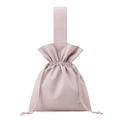 Detail of light pink nylon pouch showing drawstring closure and soft fabric texture - Peach Pink