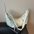 Fashionable mint green crescent shoulder bag with knotted strap and tassel detail - Green with Pendant