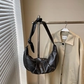 Minimalist black crescent shoulder bag in pleated leather with knotted wide strap design - Black without Pendant