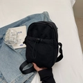 Minimalist black nylon crossbody bag with drawstring pocket for casual daily use - Black