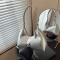 Metallic silver crescent hobo bag for women with sleek shoulder strap and zipper closure - Silver