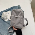 Minimalist grey nylon drawstring crossbody bag with adjustable straps for daily use - Gray