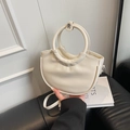 Minimalist cream-colored half-moon bucket bag with circular handle and slender strap - Off White
