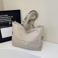 Grand sac cabas en toile beige avec bandoulière jacquard et motif logo trèfle - Blanc Cassé