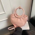Pink semi-circle handbag with large round top handle and detachable strap in glossy finish - Pink