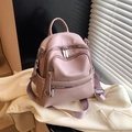 Pink lychee texture leather backpack with multiple zipper pockets and silver hardware - Pink