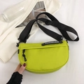 Lime green nylon saddle bag with adjustable wide black strap and fashion rubber label - Green