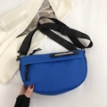 Deep blue nylon saddle bag with wide adjustable strap and Fashion & Bag text detail - Blue