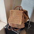 Handwoven straw backpack for women with brown leather straps and drawstring closure - Khaki