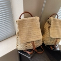 Beige straw woven backpack with brown leather straps and drawstring closure for summer - Off White
