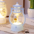 Detail of retro LED lantern night light with cartoon angel and warm glowing light - Blue Angel Boy B