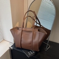 Brown large capacity leather tote bag with wing sides and white stitching details - Brown