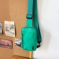 Vibrant lime green nylon crossbody chest bag with adjustable strap and front pocket - Turquoise Green