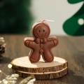 Brown gingerbread man scented candle with cute bow detail on a rustic wood base - Brown (New)