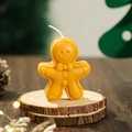 Cute orange gingerbread man scented candle on a rustic wooden base for Christmas - Ginger Yellow (New)