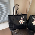 Black embossed leather tote bag with star plush pendant and twin shoulder straps - With Charm / Black