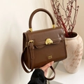 Vintage brown leather crossbody bag with golden bulldog buckle and adjustable strap - No Pendant / Brown