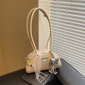Chic cream bow shoulder bag with lace ribbon and silver pendant in soft lighting - Off-white (With Pendant)