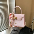Pink vintage flap square handbag featuring a golden dog-head buckle and silk scarf - Pink with Pendant