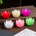 Six-piece set of lotus LED electronic candles in multiple colors on a wooden table - Multicolor