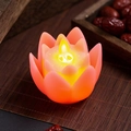 Buddhist lotus LED electronic candle lamp with flickering flame on a bamboo mat - Pink