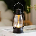 Vintage LED lantern with matte black base and warm flickering light for cozy decor - Black