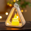 Vintage style triangular LED lantern with flickering candle on antique books - White