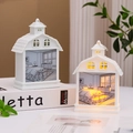 Detail of a house-shaped LED night light with warm yellow glow and bedroom scene - Letter F