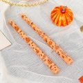 Pair of 25cm orange taper candles with Halloween pumpkin and ghost prints for decor - Ghost Pumpkin / Orange