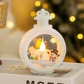 Close-up of a white Christmas lantern featuring a snowman and warm LED candle light - Round Lantern-White Snowman