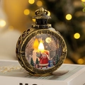 Close-up of vintage bronze Christmas lantern with Santa Claus and LED candle light - Round Lantern-Bronze Santa