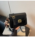 Detail of black crossbody square bag with cartoon doll pendant and pearl chain decoration - Black with Pendant